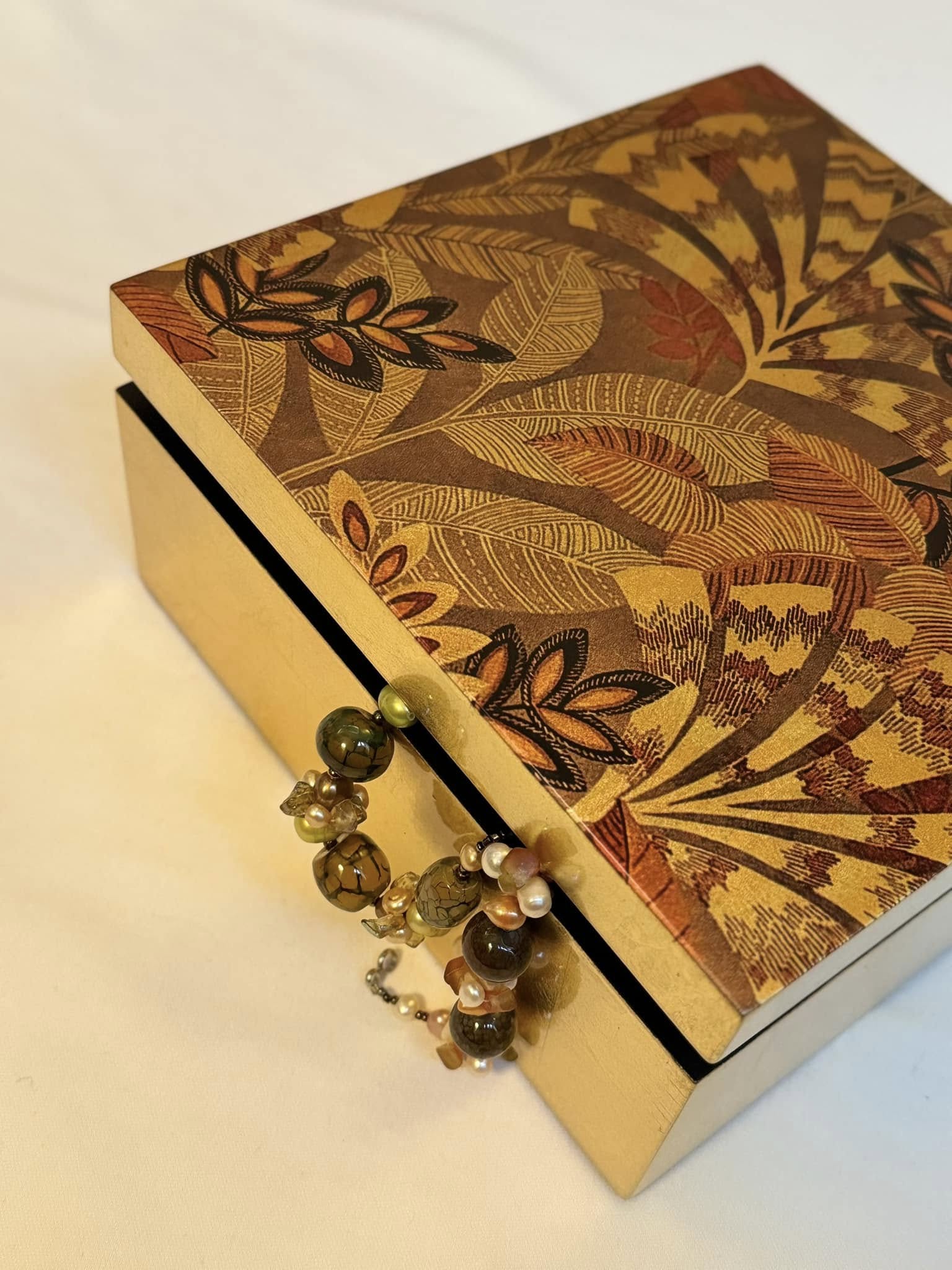 Decorative gift box with a botanical pattern